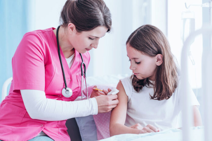 Nurse giving an injection